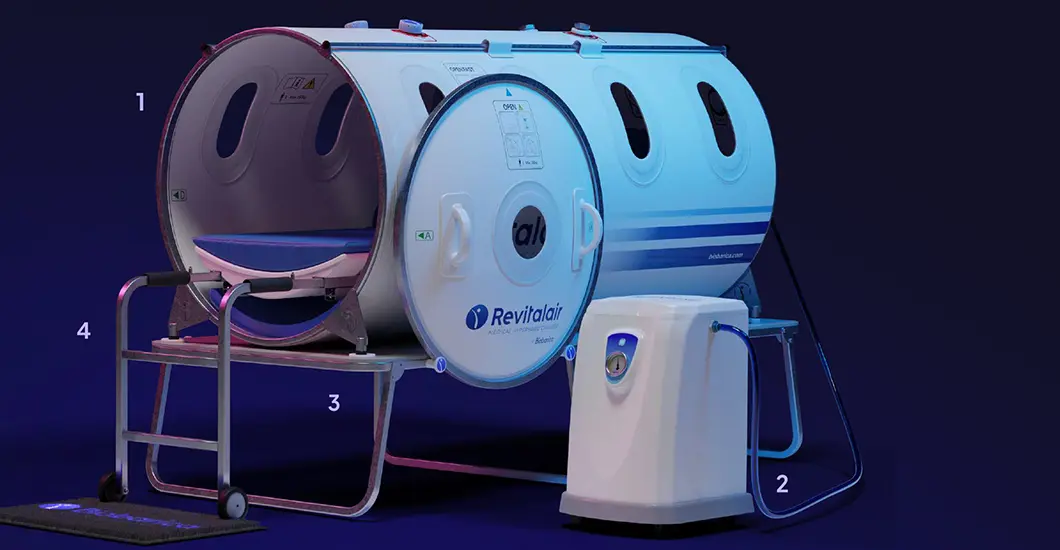 Cámara hiperbárica Revitalair con cabina, compresor, mesa de apoyo y camilla